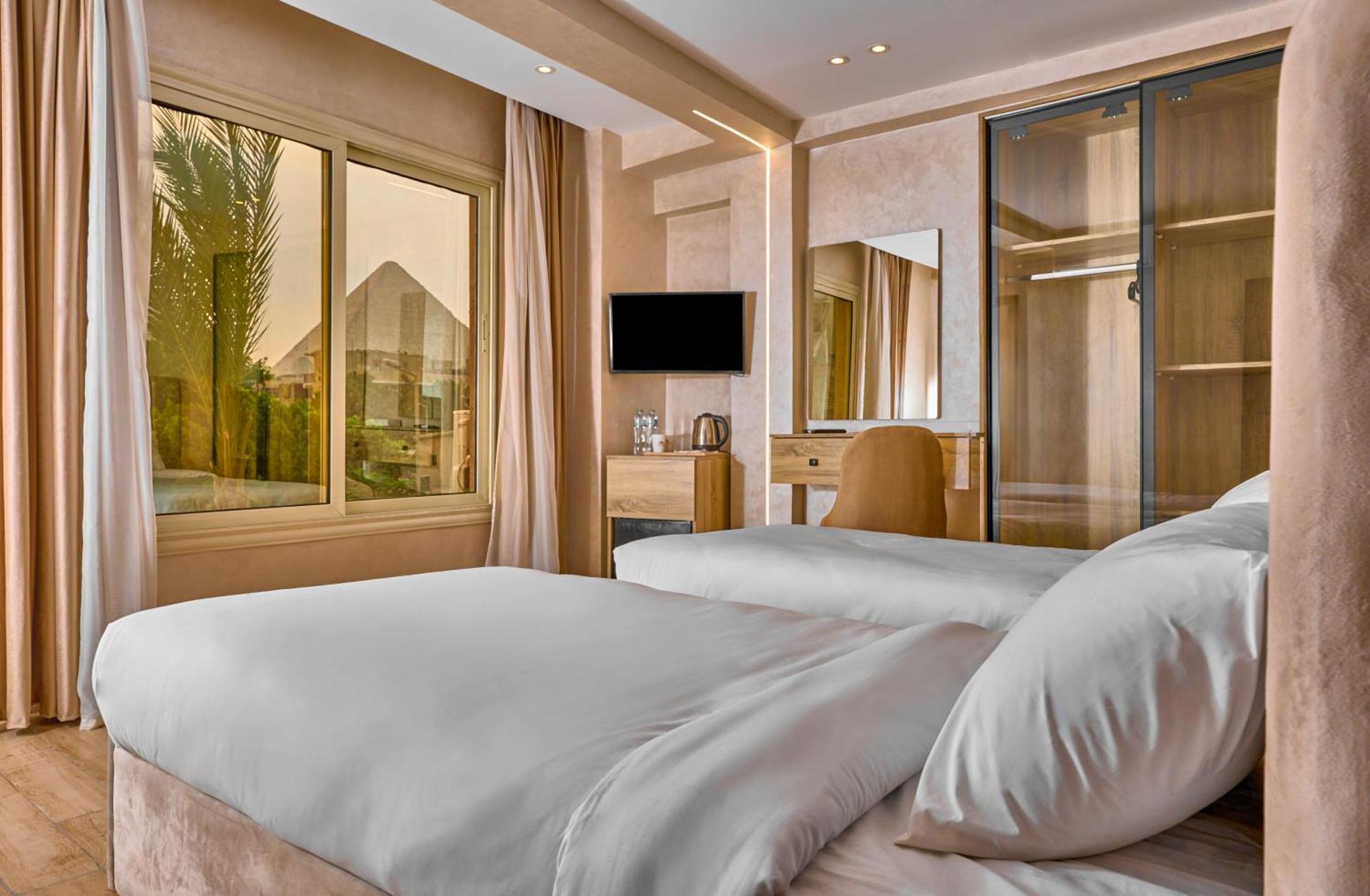 Hotel Cleopatra Tower Pyramid View Kafret el-Gabal Esterno foto